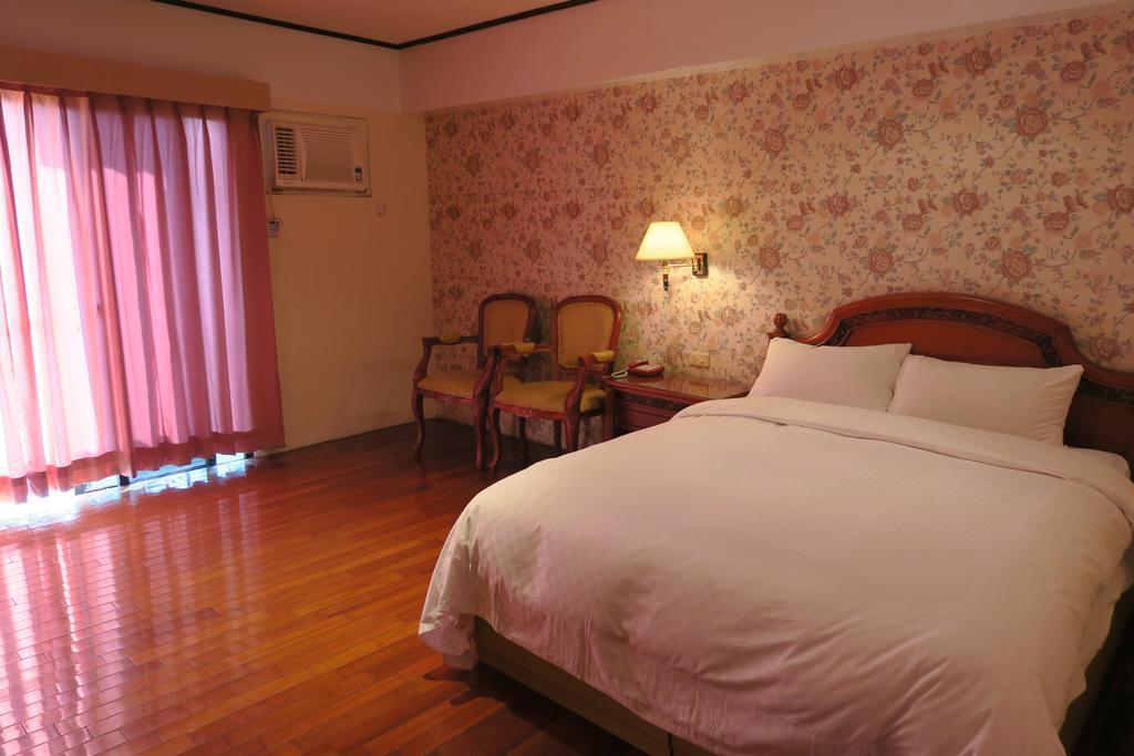 Champagne Hotel Jiaoxi Zimmer foto