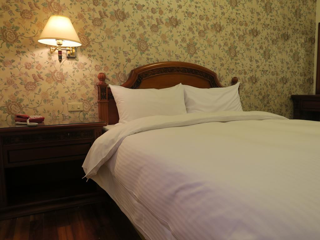 Champagne Hotel Jiaoxi Zimmer foto